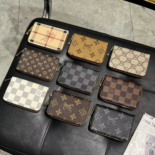 Collezione di portafogli con cerniera di lusso con monogramma: LV, GG e BBR